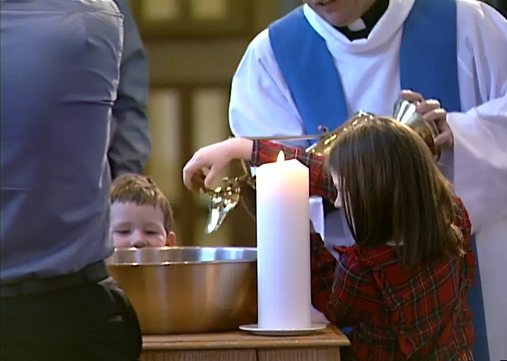 Children helping at Baptism
